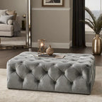 Pouffe rectangulaire capitonné sur roulettes