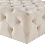 Pouffe rectangulaire capitonné sur roulettes
