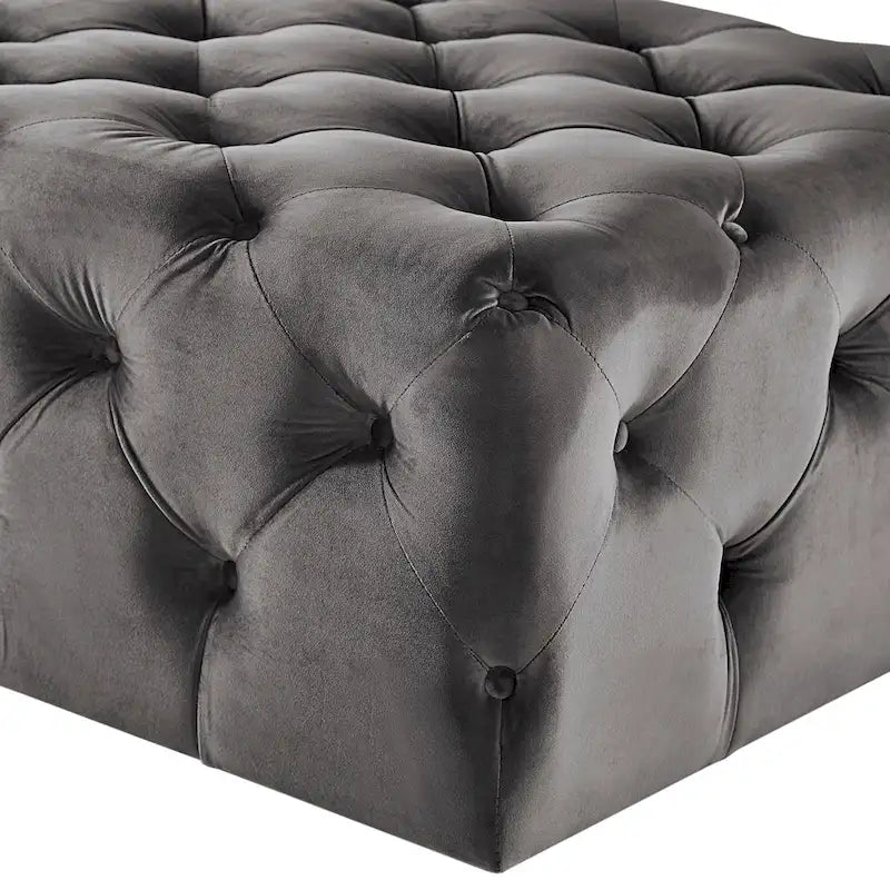 Pouffe rectangulaire capitonné sur roulettes