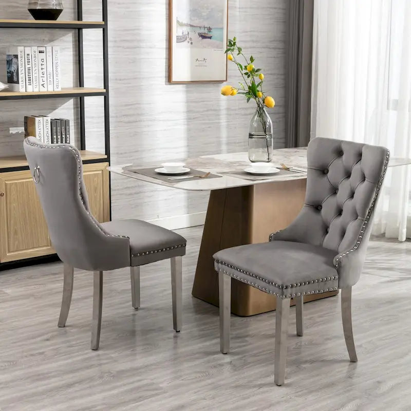 Chaise de salle à manger en velours avec clous décoratifs et pieds en acier inoxydable chromé