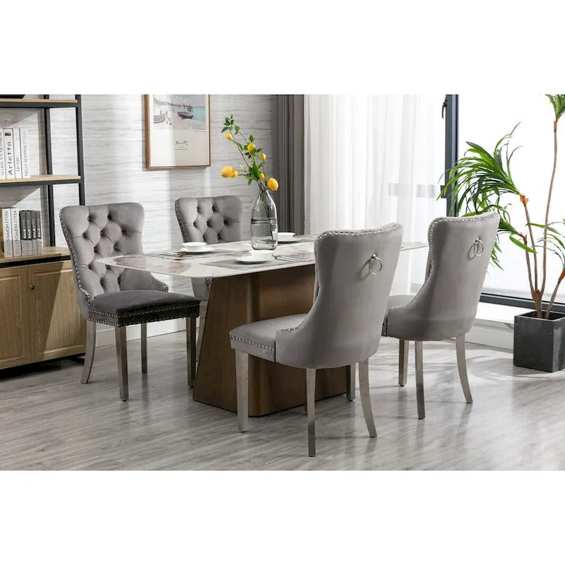 Chaise de salle à manger en velours avec clous décoratifs et pieds en acier inoxydable chromé